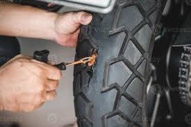 reparo pneu de moto furado